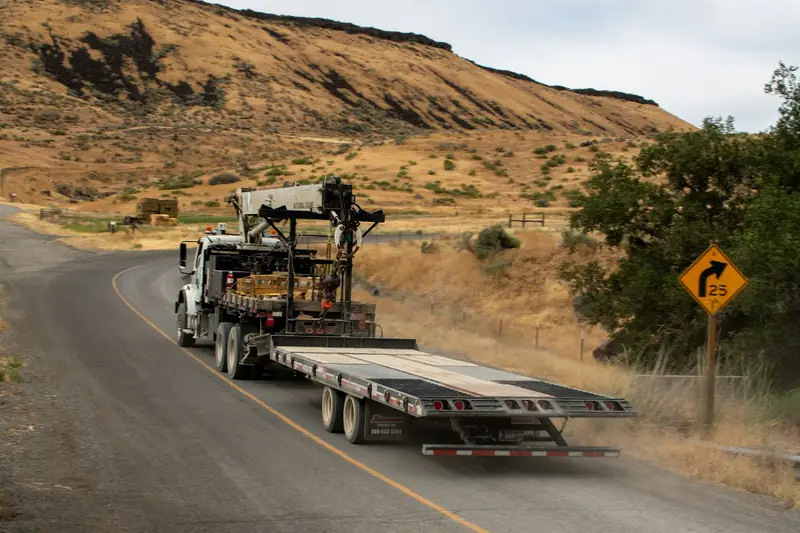 Semi truck hauling freight on a highway — Sioux Falls truck accident lawyer